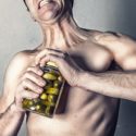 man opening a jar